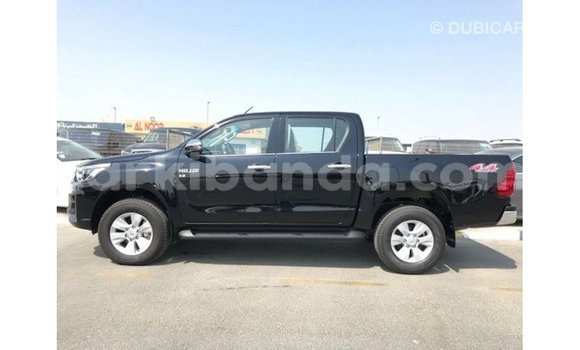 Nunua Imported Toyota Hilux Nyeusi Gari ndani ya Import - Dubai nchini Uganda Nunua Imported Toyota Hilux Nyeusi Gari ndani ya Import - Dubai nchini Uganda