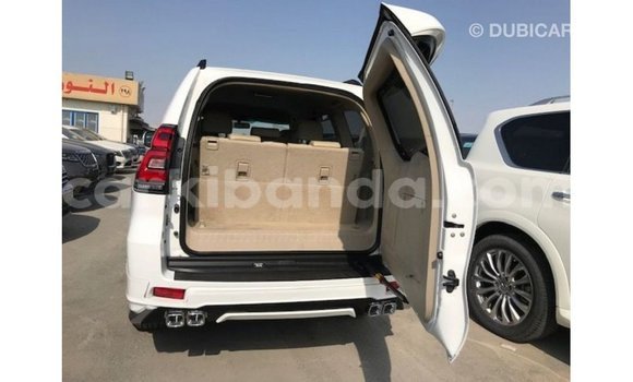 Gura Imported Toyota Prado White Imodoka i Import - Dubai mu Uganda Gura Imported Toyota Prado White Imodoka i Import - Dubai mu Uganda