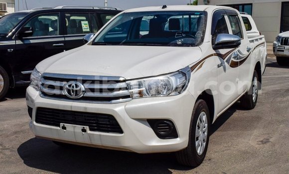 Buy Import Toyota Hilux White Car in Import - Dubai in Uganda Buy Import Toyota Hilux White Car in Import - Dubai in Uganda