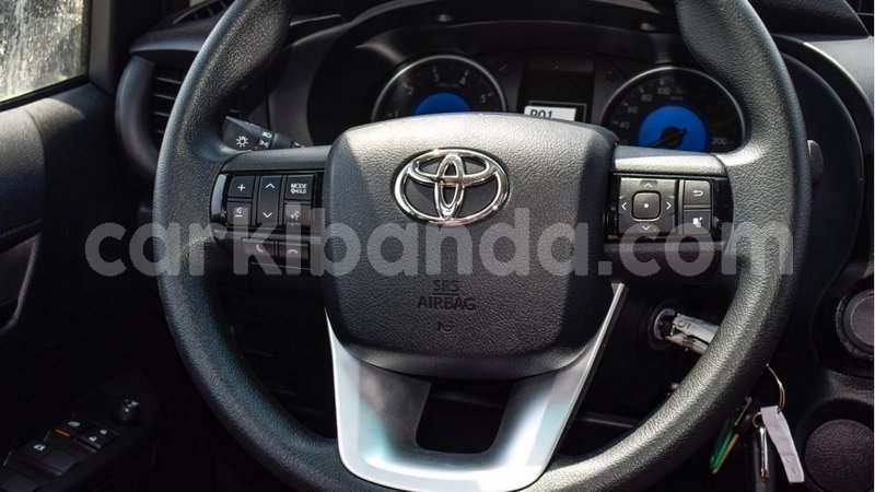 Big with watermark toyota hilux uganda import dubai 9508