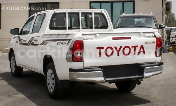 Buy Import Toyota Hilux White Car in Import - Dubai in Uganda Buy Import Toyota Hilux White Car in Import - Dubai in Uganda