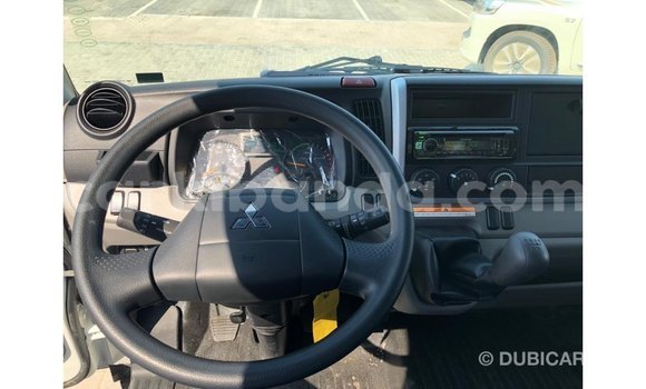 Buy Import Mitsubishi Carisma White Car in Import - Dubai in Uganda Buy Import Mitsubishi Carisma White Car in Import - Dubai in Uganda