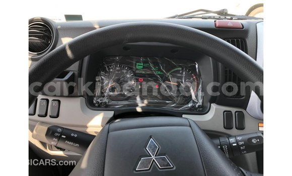 Buy Import Mitsubishi Carisma White Car in Import - Dubai in Uganda Buy Import Mitsubishi Carisma White Car in Import - Dubai in Uganda