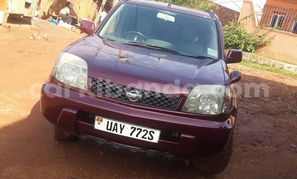 Acheter Occasion Voiture Nissan X–Trail Rouge à Kampala, Ouganda Acheter Occasion Voiture Nissan X–Trail Rouge à Kampala, Ouganda