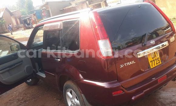 Acheter Occasion Voiture Nissan X–Trail Rouge à Kampala, Ouganda Acheter Occasion Voiture Nissan X–Trail Rouge à Kampala, Ouganda