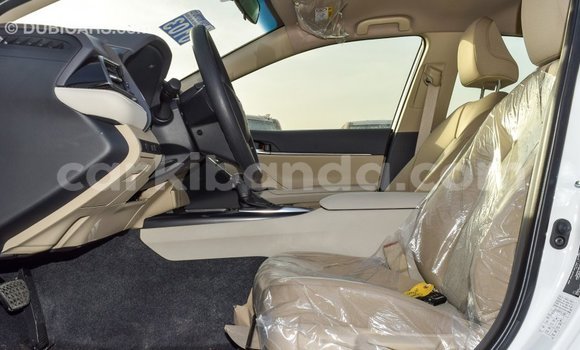 Gura Imported Toyota Camry White Imodoka i Import - Dubai mu Uganda Gura Imported Toyota Camry White Imodoka i Import - Dubai mu Uganda