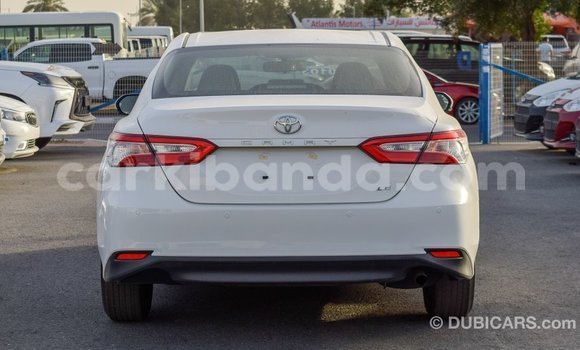 Gura Imported Toyota Camry White Imodoka i Import - Dubai mu Uganda Gura Imported Toyota Camry White Imodoka i Import - Dubai mu Uganda
