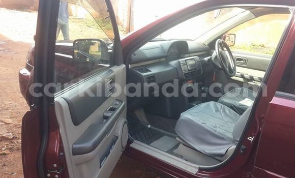 Acheter Occasion Voiture Nissan X–Trail Rouge à Kampala, Ouganda Acheter Occasion Voiture Nissan X–Trail Rouge à Kampala, Ouganda