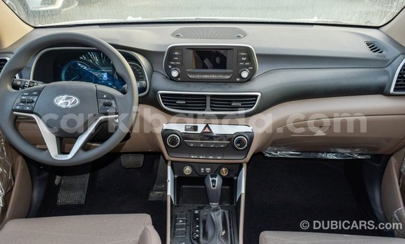 Gura Imported Hyundai Tucson White Imodoka i Import - Dubai mu Uganda Gura Imported Hyundai Tucson White Imodoka i Import - Dubai mu Uganda