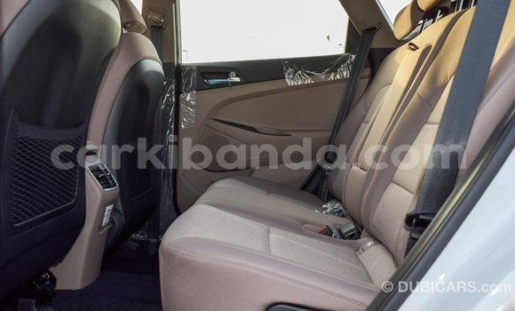 Gura Imported Hyundai Tucson White Imodoka i Import - Dubai mu Uganda Gura Imported Hyundai Tucson White Imodoka i Import - Dubai mu Uganda