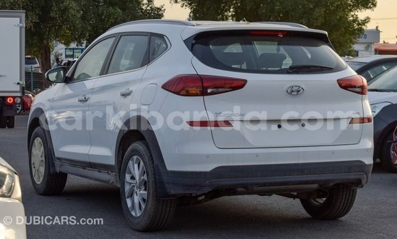 Gura Imported Hyundai Tucson White Imodoka i Import - Dubai mu Uganda Gura Imported Hyundai Tucson White Imodoka i Import - Dubai mu Uganda