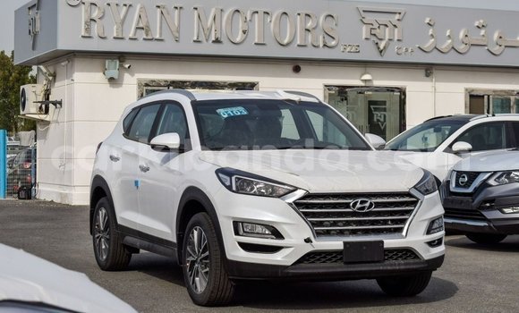 Gura Imported Hyundai Tucson White Imodoka i Import - Dubai mu Uganda Gura Imported Hyundai Tucson White Imodoka i Import - Dubai mu Uganda