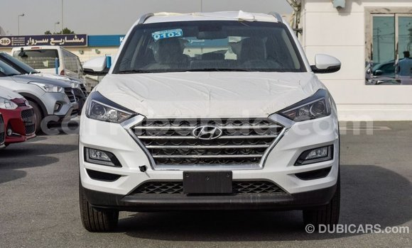 Gura Imported Hyundai Tucson White Imodoka i Import - Dubai mu Uganda Gura Imported Hyundai Tucson White Imodoka i Import - Dubai mu Uganda