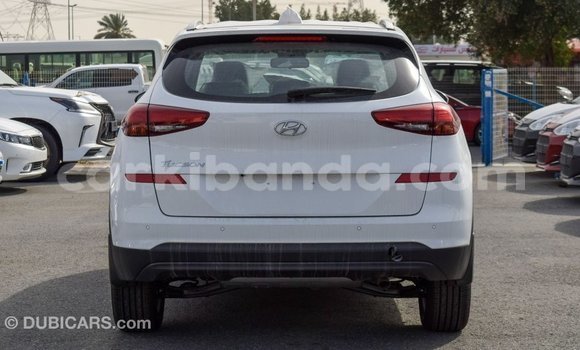 Gura Imported Hyundai Tucson White Imodoka i Import - Dubai mu Uganda Gura Imported Hyundai Tucson White Imodoka i Import - Dubai mu Uganda