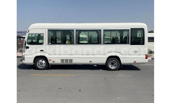 Buy Import Toyota Coaster White Car in Import - Dubai in Uganda Buy Import Toyota Coaster White Car in Import - Dubai in Uganda
