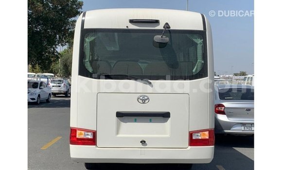 Buy Import Toyota Coaster White Car in Import - Dubai in Uganda Buy Import Toyota Coaster White Car in Import - Dubai in Uganda
