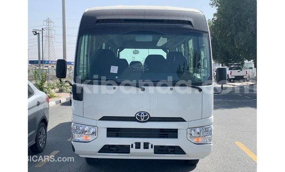 Buy Import Toyota Coaster White Car in Import - Dubai in Uganda Buy Import Toyota Coaster White Car in Import - Dubai in Uganda