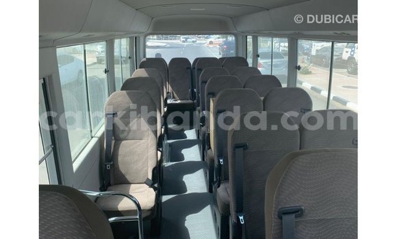 Buy Import Toyota Coaster White Car in Import - Dubai in Uganda Buy Import Toyota Coaster White Car in Import - Dubai in Uganda