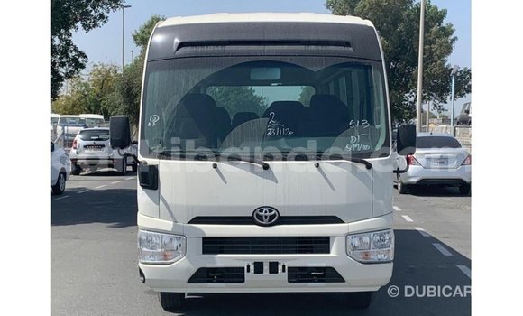 Buy Import Toyota Coaster White Car in Import - Dubai in Uganda Buy Import Toyota Coaster White Car in Import - Dubai in Uganda