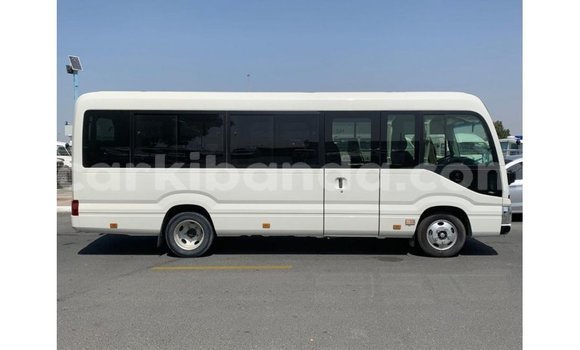 Buy Import Toyota Coaster White Car in Import - Dubai in Uganda Buy Import Toyota Coaster White Car in Import - Dubai in Uganda