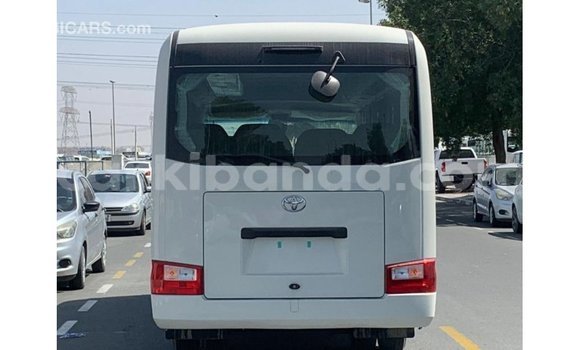 Buy Import Toyota Coaster White Car in Import - Dubai in Uganda Buy Import Toyota Coaster White Car in Import - Dubai in Uganda