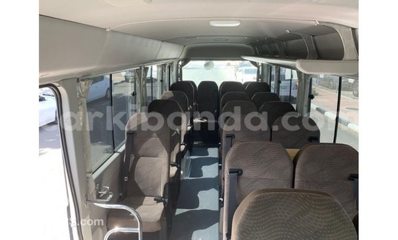Buy Import Toyota Coaster White Car in Import - Dubai in Uganda Buy Import Toyota Coaster White Car in Import - Dubai in Uganda