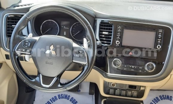 Buy Import Mitsubishi Outlander White Car in Import - Dubai in Uganda Buy Import Mitsubishi Outlander White Car in Import - Dubai in Uganda