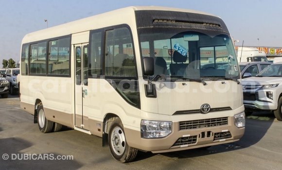 Buy Import Toyota Coaster White Car in Import - Dubai in Uganda Buy Import Toyota Coaster White Car in Import - Dubai in Uganda