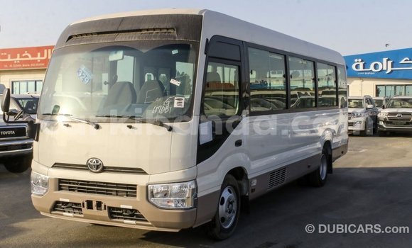 Buy Import Toyota Coaster White Car in Import - Dubai in Uganda Buy Import Toyota Coaster White Car in Import - Dubai in Uganda