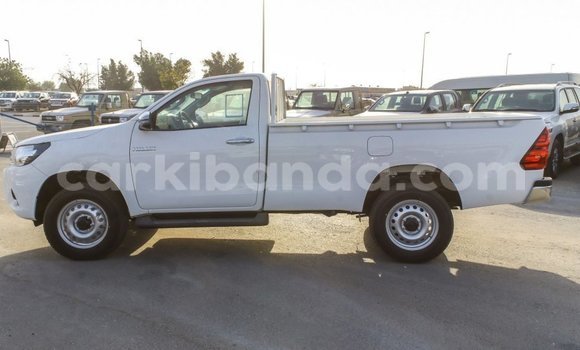 Buy Import Toyota Hilux White Car in Import - Dubai in Uganda Buy Import Toyota Hilux White Car in Import - Dubai in Uganda
