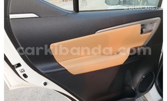 Gura Imported Toyota Fortuner White Imodoka i Import - Dubai mu Uganda Gura Imported Toyota Fortuner White Imodoka i Import - Dubai mu Uganda