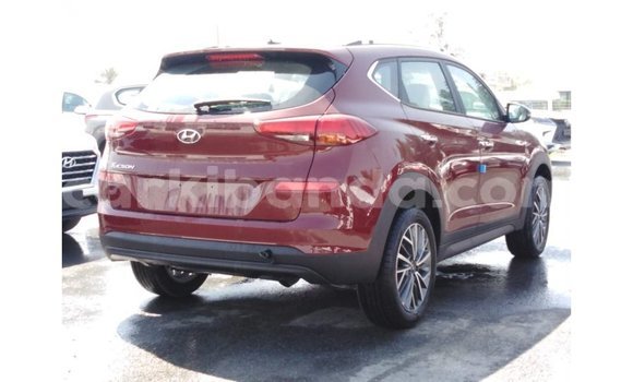 Gura Imported Hyundai Tucson Red Imodoka i Import - Dubai mu Uganda Gura Imported Hyundai Tucson Red Imodoka i Import - Dubai mu Uganda