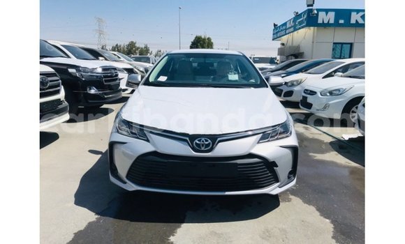 Buy Import Toyota Corolla White Car in Import - Dubai in Uganda Buy Import Toyota Corolla White Car in Import - Dubai in Uganda