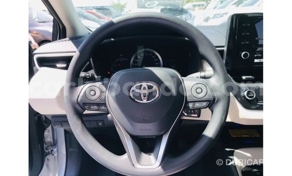 Buy Import Toyota Corolla White Car in Import - Dubai in Uganda Buy Import Toyota Corolla White Car in Import - Dubai in Uganda