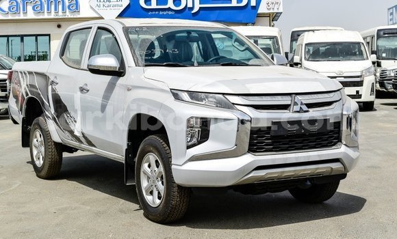 Buy Import Mitsubishi L200 White Car in Import - Dubai in Uganda Buy Import Mitsubishi L200 White Car in Import - Dubai in Uganda
