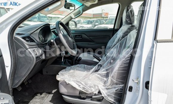 Buy Import Mitsubishi L200 White Car in Import - Dubai in Uganda Buy Import Mitsubishi L200 White Car in Import - Dubai in Uganda