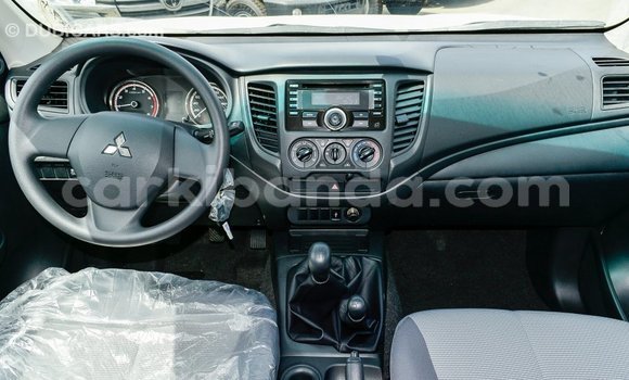 Buy Import Mitsubishi L200 White Car in Import - Dubai in Uganda Buy Import Mitsubishi L200 White Car in Import - Dubai in Uganda