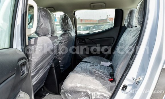 Buy Import Mitsubishi L200 White Car in Import - Dubai in Uganda Buy Import Mitsubishi L200 White Car in Import - Dubai in Uganda