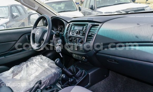 Buy Import Mitsubishi L200 White Car in Import - Dubai in Uganda Buy Import Mitsubishi L200 White Car in Import - Dubai in Uganda