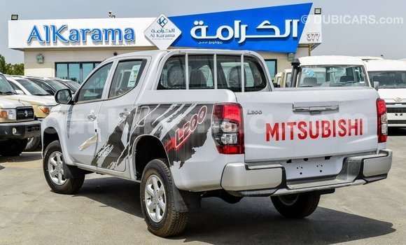 Buy Import Mitsubishi L200 White Car in Import - Dubai in Uganda Buy Import Mitsubishi L200 White Car in Import - Dubai in Uganda