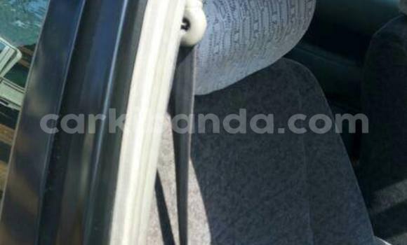 Gura Yakoze Toyota Corolla Silver Imodoka i Kampala mu Uganda Gura Yakoze Toyota Corolla Silver Imodoka i Kampala mu Uganda