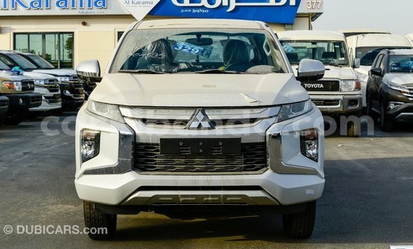 Buy Import Mitsubishi L200 White Car in Import - Dubai in Uganda Buy Import Mitsubishi L200 White Car in Import - Dubai in Uganda