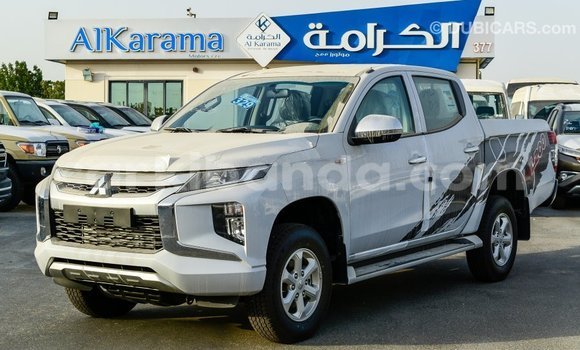Buy Import Mitsubishi L200 White Car in Import - Dubai in Uganda Buy Import Mitsubishi L200 White Car in Import - Dubai in Uganda