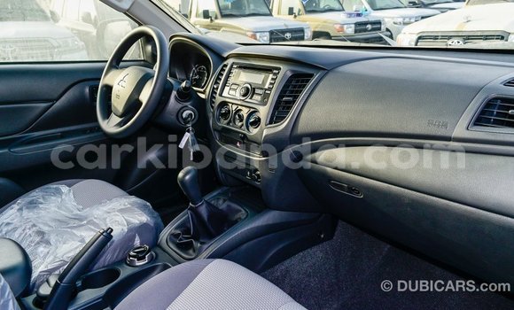 Buy Import Mitsubishi L200 White Car in Import - Dubai in Uganda Buy Import Mitsubishi L200 White Car in Import - Dubai in Uganda