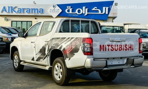 Buy Import Mitsubishi L200 White Car in Import - Dubai in Uganda Buy Import Mitsubishi L200 White Car in Import - Dubai in Uganda