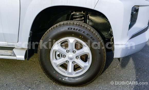 Buy Import Mitsubishi L200 White Car in Import - Dubai in Uganda Buy Import Mitsubishi L200 White Car in Import - Dubai in Uganda