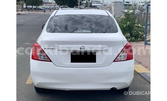 Gura Imported Nissan Sunny White Imodoka i Import - Dubai mu Uganda Gura Imported Nissan Sunny White Imodoka i Import - Dubai mu Uganda
