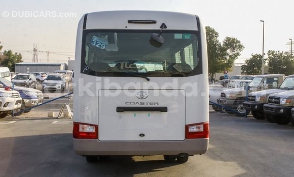 Buy Import Toyota Coaster White Car in Import - Dubai in Uganda Buy Import Toyota Coaster White Car in Import - Dubai in Uganda