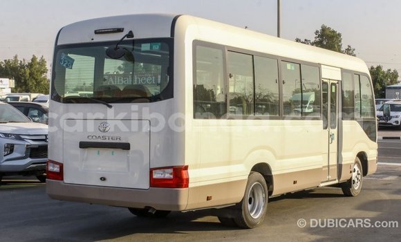 Buy Import Toyota Coaster White Car in Import - Dubai in Uganda Buy Import Toyota Coaster White Car in Import - Dubai in Uganda