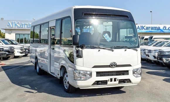 Acheter Import Voiture Toyota Coaster Blanc à Import - Dubai, Ouganda Acheter Import Voiture Toyota Coaster Blanc à Import - Dubai, Ouganda